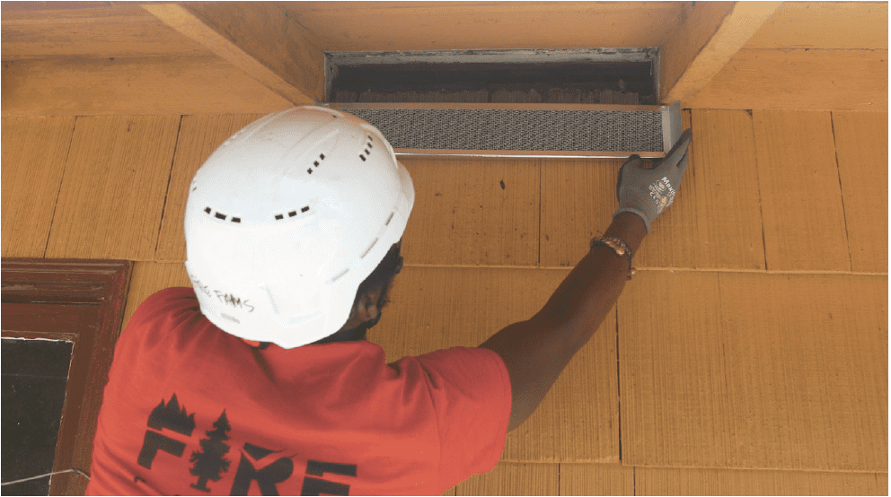 man installing vents